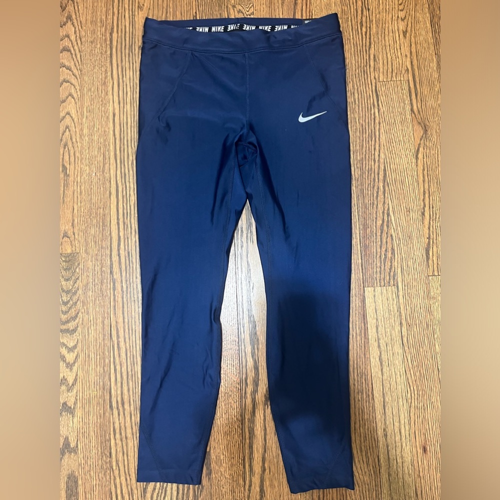 NWT Nike women’s Navy Speed Tight Fit Leggings